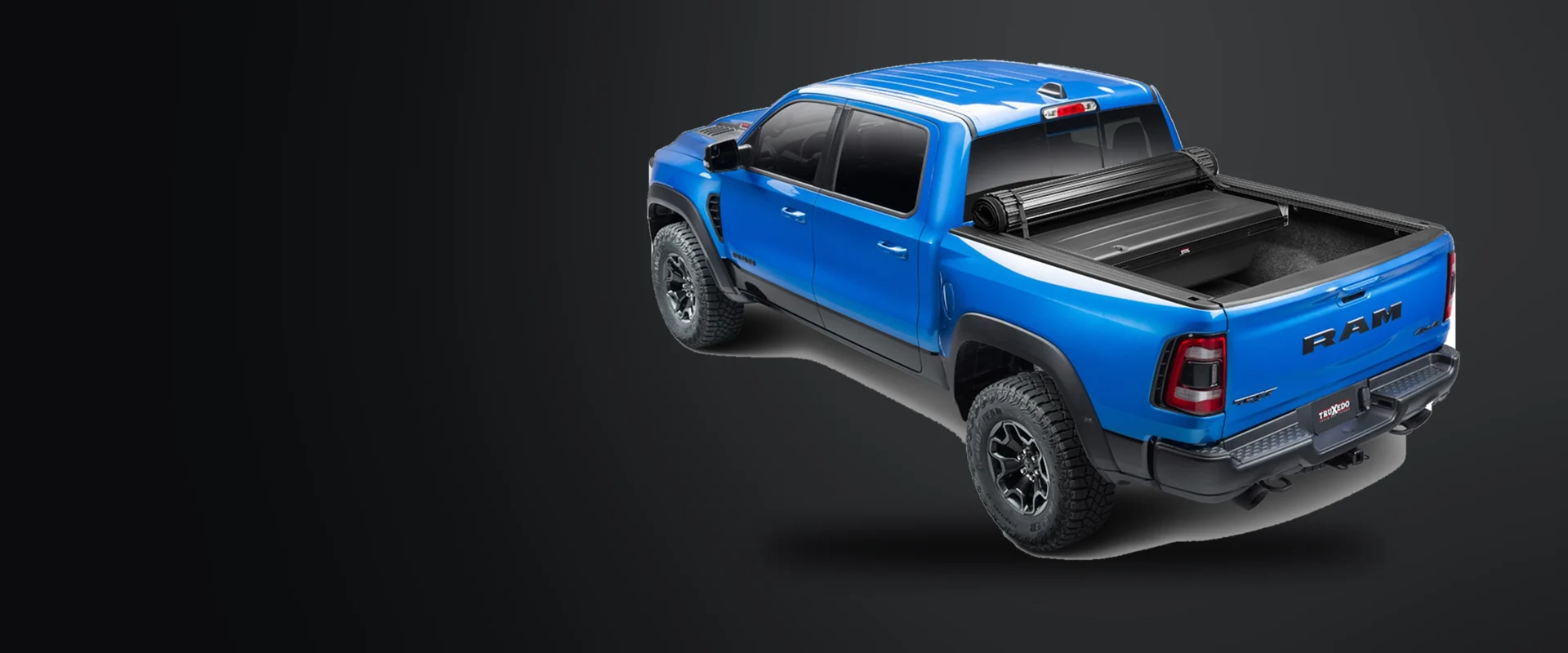 Ram 1500 TRX fitted with a TruXedo roll-up tonneau cover